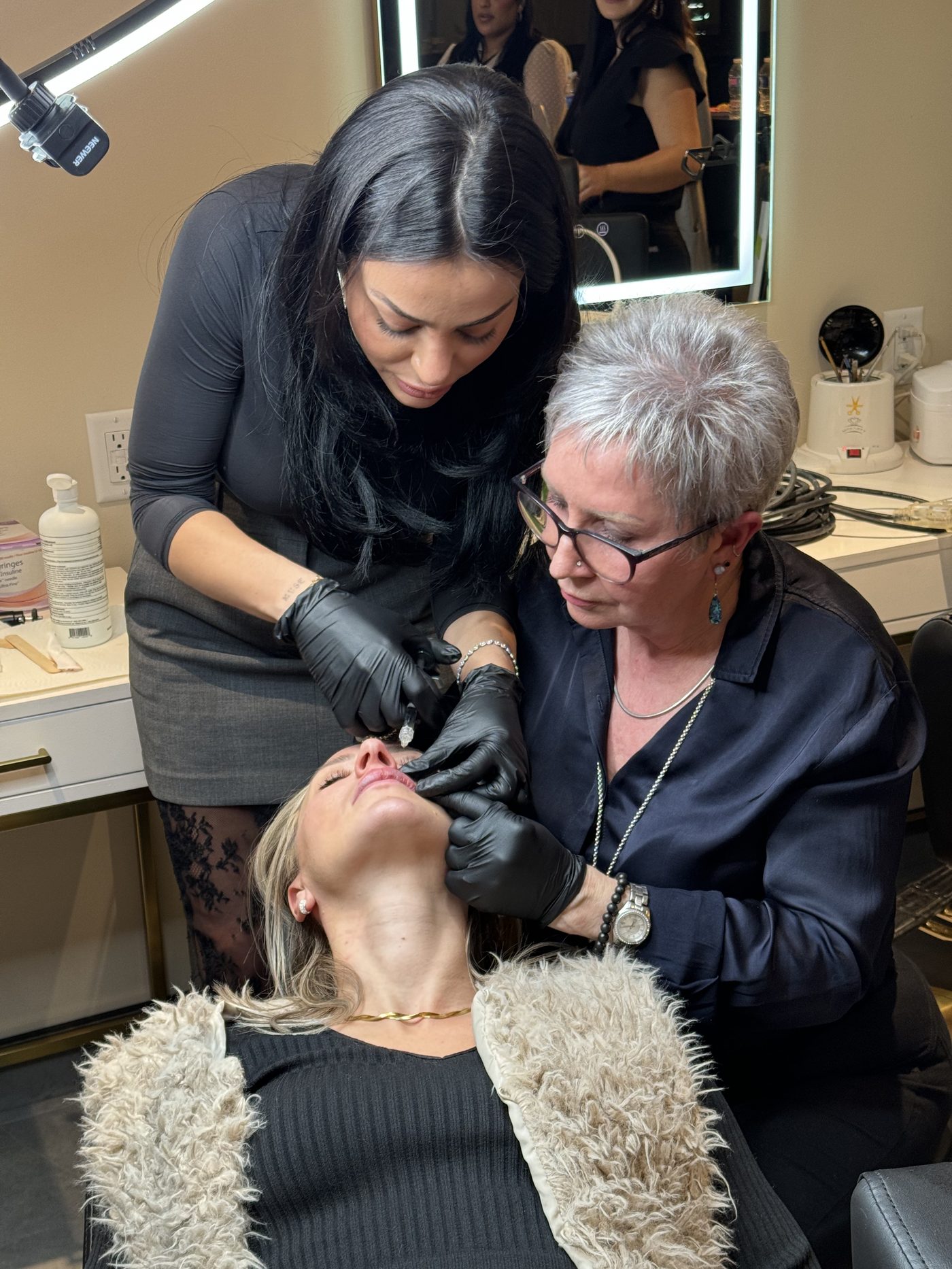 Nurse Yara performing an injectable treatment on a client at the Milton med spa clinic